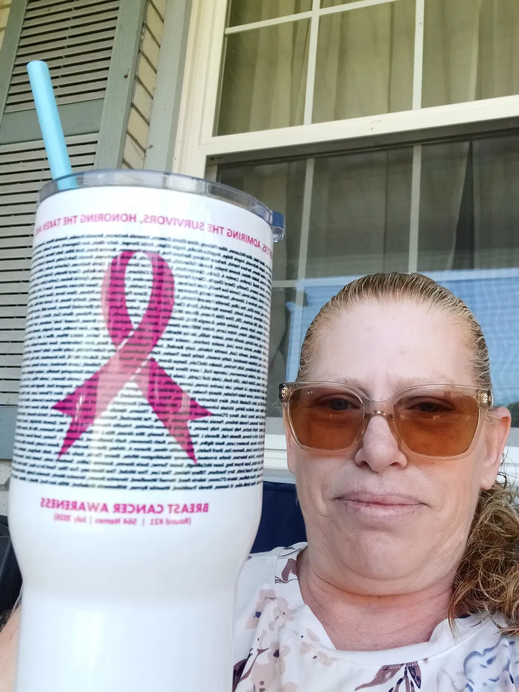 Supporter wearing a Breast Cancer Awareness Story Shirt