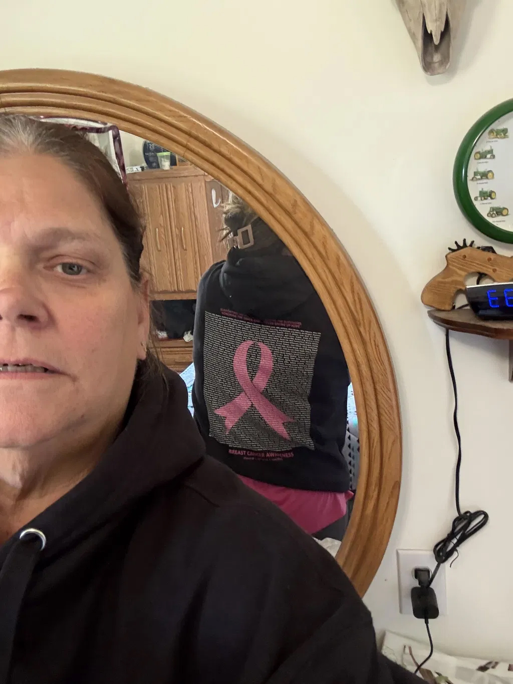 Supporter wearing a Breast Cancer Awareness Story Shirt