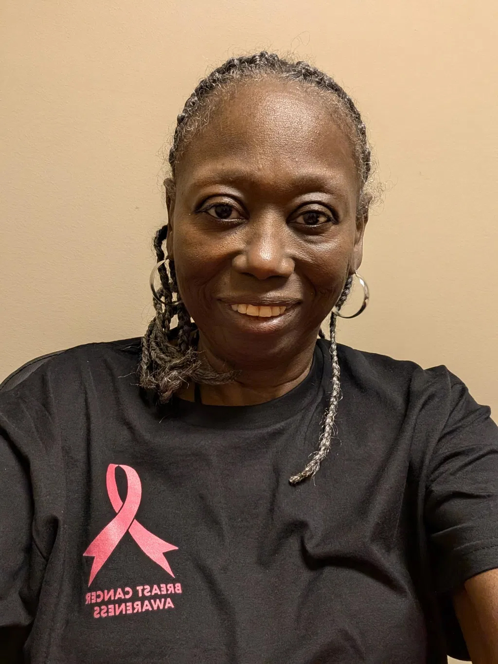 Supporter wearing a Breast Cancer Awareness Story Shirt