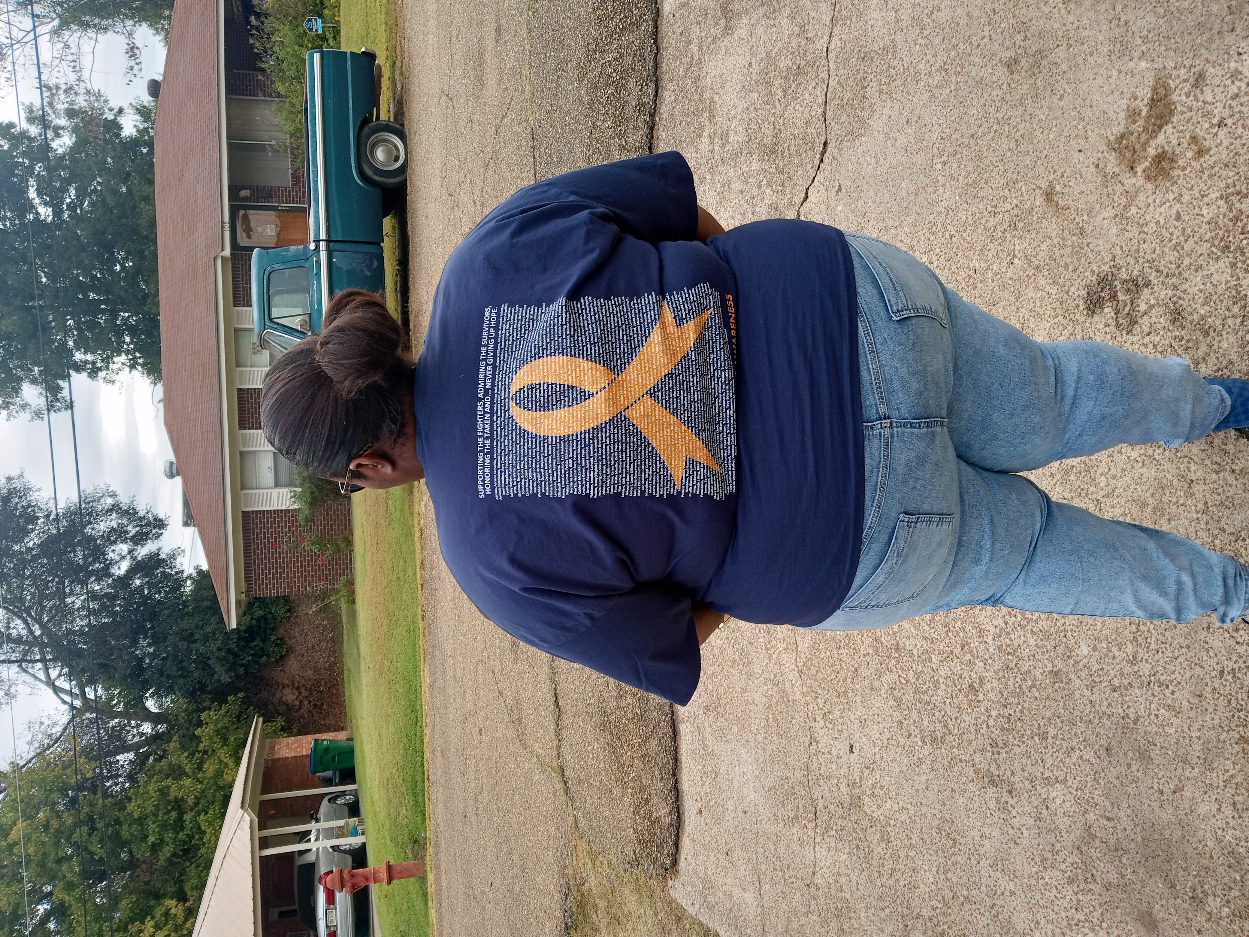 Supporter wearing a Multiple Sclerosis Awareness Story Shirt