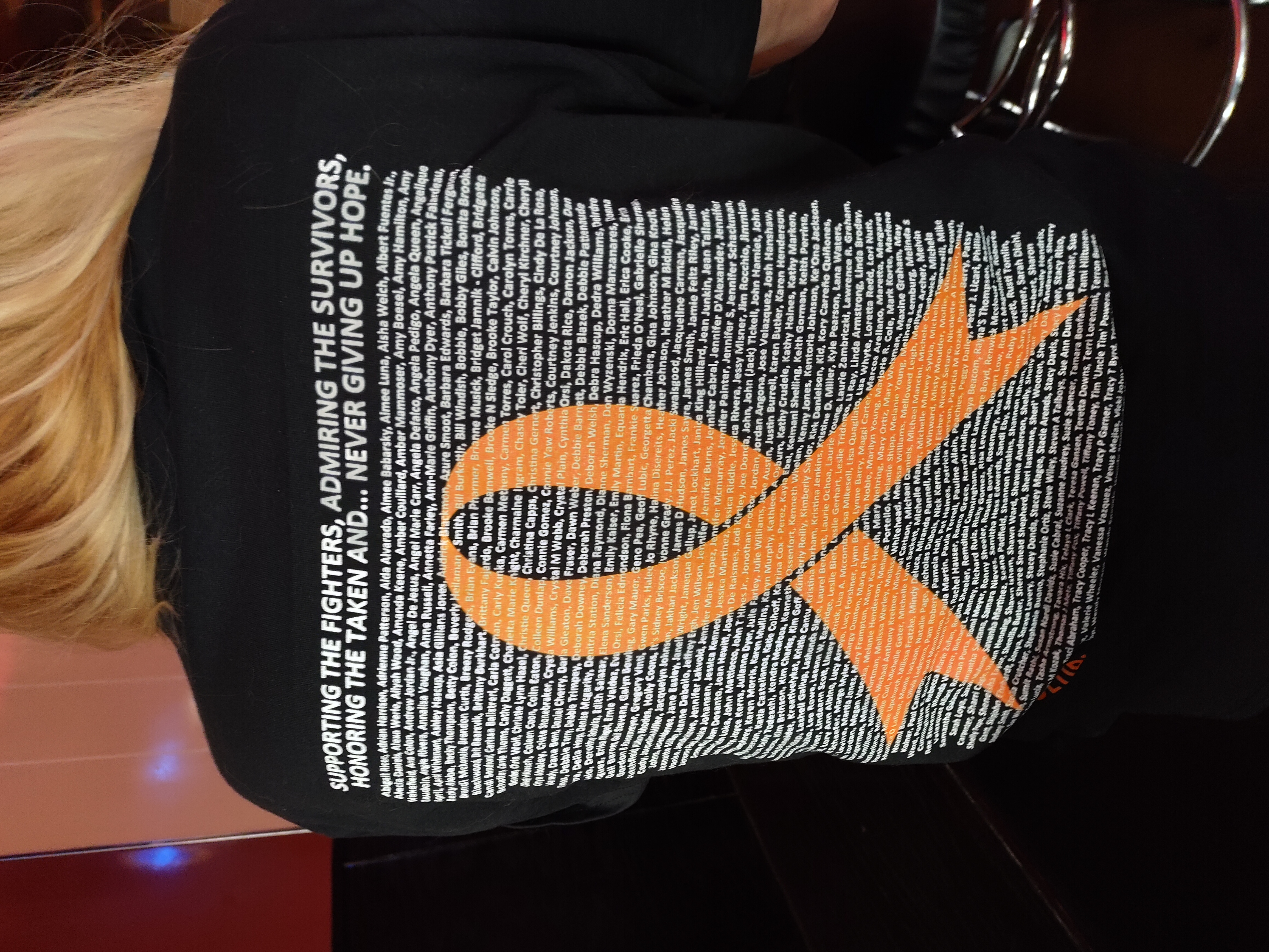 Supporter wearing a Multiple Sclerosis Awareness Story Shirt